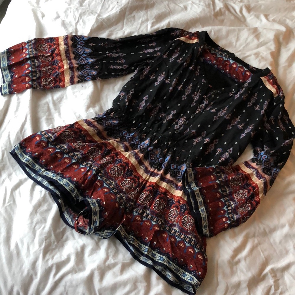 Beautiful long sleeve button front romper